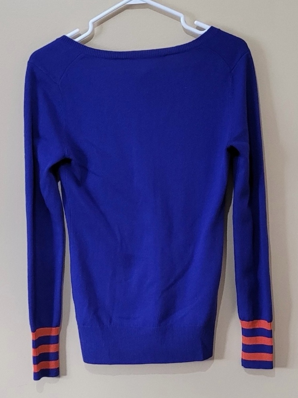 Trina Turk Cobalt V-Neck Sweater with Orange Stripe Cuffs - Picture 2 of 5